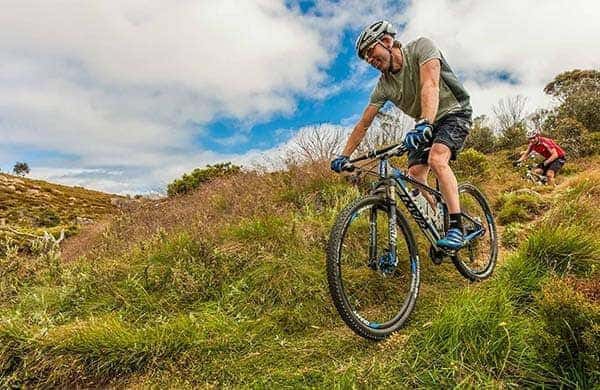 2 men Mountain Biking near Sagres