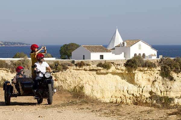 3 people on Portimão Motorbike Sidecar Tour in Senhora da Rocha Chapel