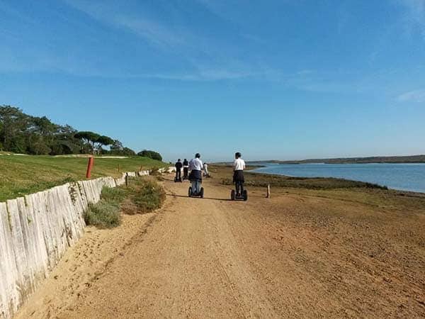 People riding segway by the sea near Vilamoura