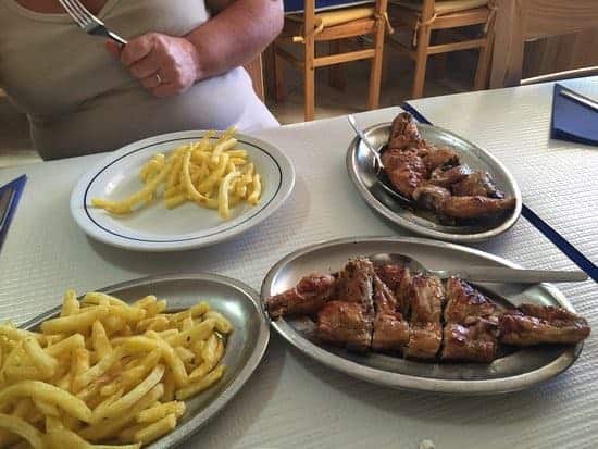 Chicken Piri piri and fries at Ribeirinho restaurant Guia