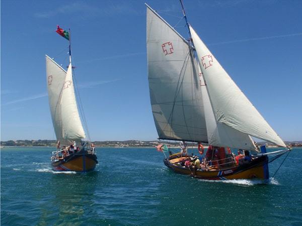 2 traditional boats in the ocean