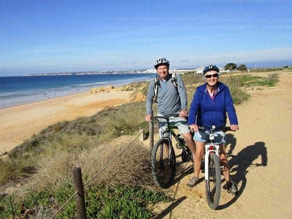 2 people on bike, near the beach, Albufeira.
