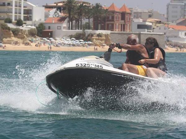 A couple on a Jet ski in Amação de Pera