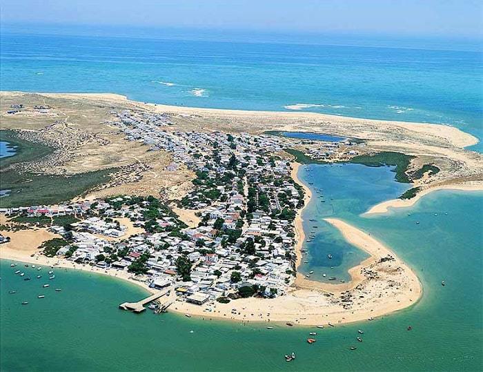 Armona Island with the harbour and the withe houses