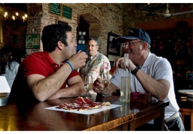 two people enjoying ham at Delicatessen restaurant